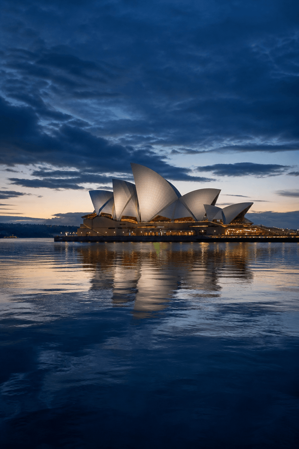 Sydney Opera House and harbour at dusk — Ideal Insurance Brokers NSW